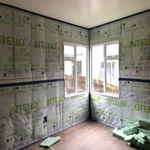 Retrofit programme inside during upgrade Full floor and ceiling insulation and double glazed windows in a house
