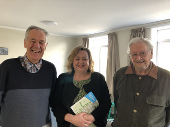 John Minister Woods and Les Two men standing with a lady