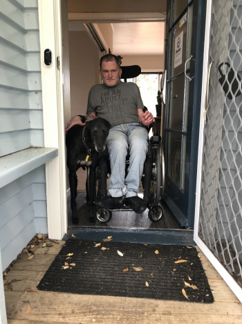 Philip Central Auckland Tenant Philip at his Kāinga Ora home with his dog Caleb, a retired Greyhound